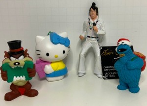 lot 132 image: Vintage Character Christmas Ornaments Including Elvis, Hello Kitty, Cookie Monster and The Tasmanian Devil