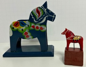 lot 241 image: Vintage Pair of Swedish DALA Horses Including a Napkin Holder and a Miniature Mounted on a Stone Base