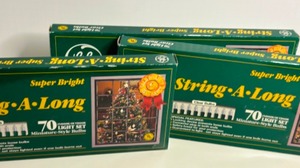 lot 325 image: CHRISTMAS Lights X3 GE String-A-Long 70 Light IndoorOutdoor Clear Warm Lights New In Box