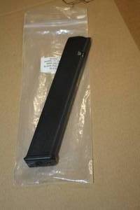 lot 573 image: Glock Model 171926 9MM 32-round Clip GLK-A8