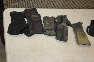 lot 595 image: (4) Belt Holsters and (1) Belt First Aid Kit