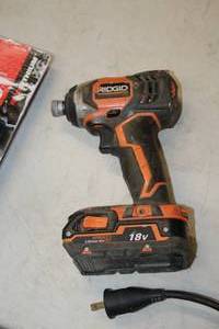 lot 955 image: Ridgid 14 18V Impact Driver R86034 with Battery