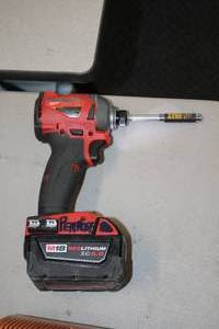 lot 977 image: Milwaukee Impact Driver J64AD200900128 with Battery