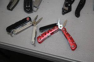 lot 1028 image: Lot of (4) Assorted Multi-Tool  Pocket Knives