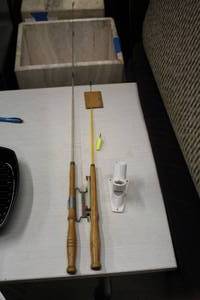 lot 1109 image: (2) Ice Fishing Rods and (1) Mounted Fishing Pole Holder