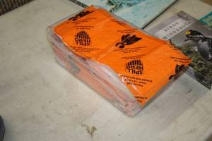 lot 1123 image: Lot of (1 Tote) Spill Hero Patches 6x6