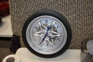 lot 1126 image: Sangtai Tire theme Battery-Powered Wall Clock 13-34