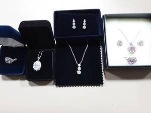 lot 31 image: 1-Danbury Mint Ring, 1-Sterling Pendant, 1-Staur NecklaceEarring Set, 1-4-Piece Pink Set