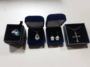 lot 32 image: 1-Stauer Ring, 1-Cross Necklace, 2-Danbury Mint (Tweety Earrings & Blue Stone Necklace)