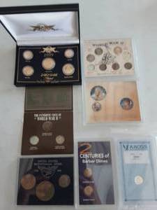 lot 123 image: 2-WWII Coin Sets, 2-Bi-Centenial Sets,1999 Gold Plated Coin Set & 2-Dime Sets