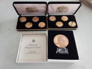 lot 125 image: 2-Sets Of Grand Casino Coins & Jimmy Carter Commemorative With Case