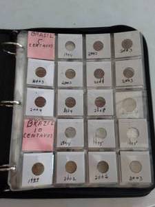 lot 137 image: Album Of Foreign Slabbed Coins-Brazil, China, East Africa, South Africa, Argentina