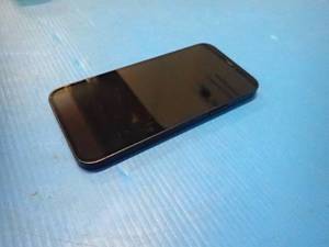 lot 67 image: Apple&nbspIphone 12 A2172  64GB of storage  Cellular Carrier Unlocked  Includes Charging Cable  Cracked back cover 