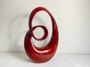 lot 26 image: Deep Red Abstract Wood Sculpture