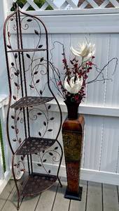 lot 41 image: Metal Corner Etagere and Decorative Multicolor Metal Vase with Arrangement