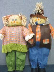 lot 87 image: Set of 34 inch Man & Woman Fall Sca...