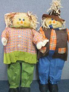 lot 89 image: Set of 34 inch Man & Woman Fall Sca...