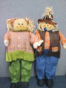 lot 92 image: Set of 34 inch Man & Woman Fall Sca...