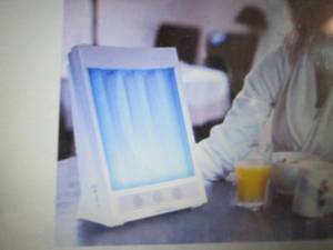 lot 273 image: SunTouch Plus Light and Ion Therapy...