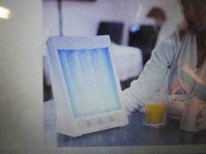 lot 274 image: SunTouch Plus Light and Ion Therapy...