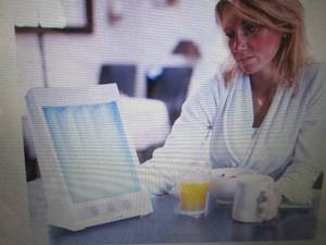 lot 284 image: SunTouch Plus Light and Ion Therapy...