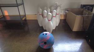 lot 137 image: Rubber Bowling Ball and Pins Set