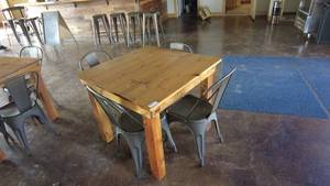 lot 40 image: Rustic Wood Dining Table with Metal Chairs Set