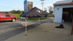 lot 69 image: Outdoor Canopy Tent with Woodlore Cider Branding
