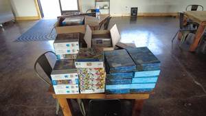 lot 70 image: Large Assortment of Jigsaw Puzzles and Board Games