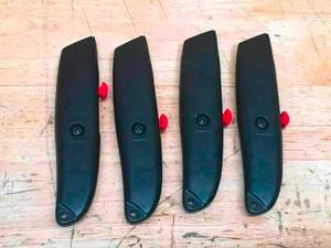 lot 83 image: Lot of 4 - Box cutters