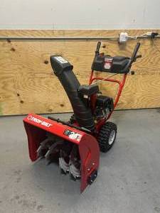 lot 4 image: TROY-BILT Storm 24 in. 208 cc Two- Stage Gas Snow Blower with Electric Start Self Propelled