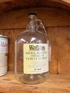 lot 49 image: Watkins 1 Gallon Vanilla Jug
