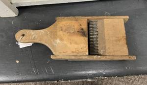 lot 136 image: Primitive Handheld Vegetable Slicer