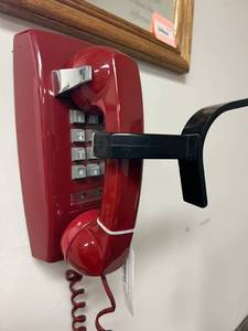 lot 153 image: Vintage Red Wall Phone with Shoulder Rest