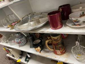 lot 188 image: Everything on 2 Shelves - Miller Beer Stein, Milk Bottles, Mugs & 1938 Hand Soap Dispenser