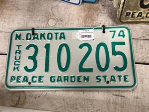 lot 318 image: 1974 ND Truck Matched Pair License Plates