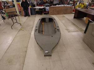 lot 2 image: Outlaw Duck Boat with Wooden Paddles