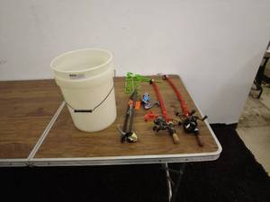 lot 58 image: Fishing Gear Set with Rods, Reels, and Accessories