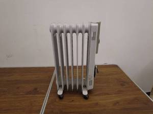 lot 64 image: Honeywell Oil-Filled Radiator Heater