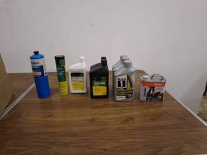 lot 83 image: Lot of Various Automotive Fluids and Propane Cylinder