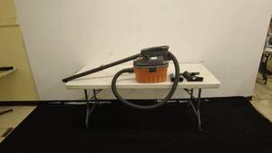 lot 193 image: RIDGID 4 Gallon 5.0 Peak HP Professional WetDry Vac Model WD40500