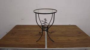 lot 129 image: Glass-Top Metal Plant Stand with Decorative Floral Design