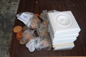 Assorted Wooden Knobs and Corner Trim Pieces