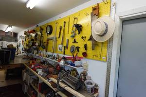 Contents of Peg Board and Work Bench - Grinder, Corded Tools, Hand Tools, Fasteners