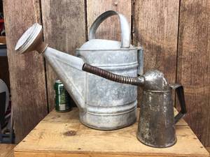 lot 137 image: Vintage Water & Oil Cans