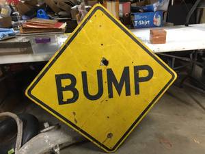 lot 171 image: Vintage Wooden Bump Sign - 30 x 30