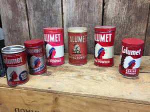 lot 209 image: Vintage Calumet Baking Powder Cans