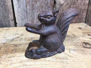 lot 211 image: Cast Iron Squirrel Candle Holder