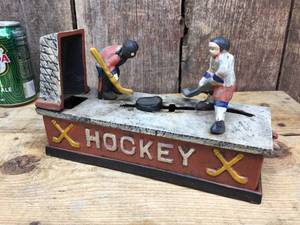 lot 265 image: Cast Iron Hockey Mechanical Coin Bank