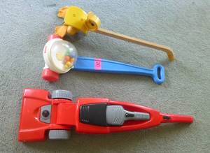 lot 20 image: THREE Push toys that make noise, duck, popper, vacuum